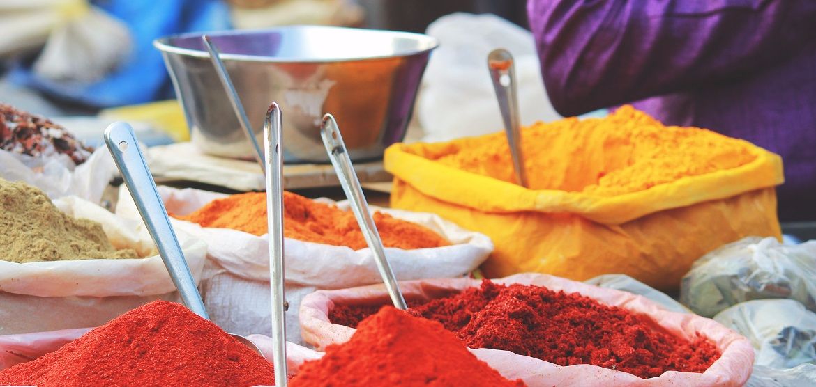 Research at table with 'Coentros & Garam Masala'